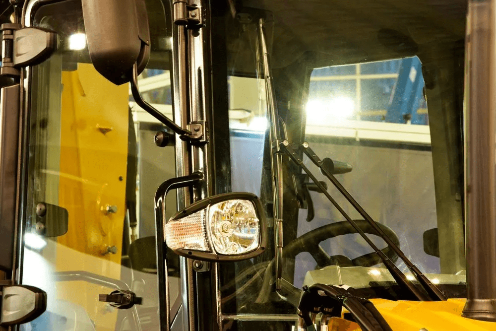 A close up of the side mirror on a vehicle.